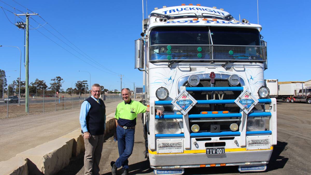 Member for Parkes Mark Coulton with road safety advocate, Rod Hannifey, who has received $5,000 for a heavy vehicle driver safety initiative, through the National Heavy Vehicle Regulators safety fund.