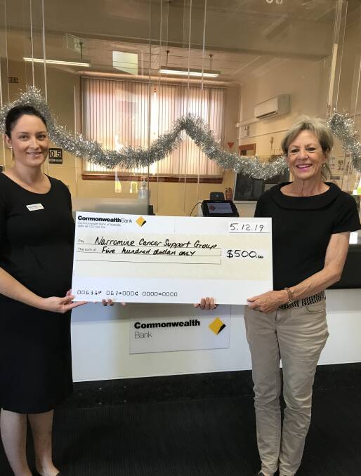 GIVING BACK: Narromine Commonwealth bank manager Rebel Chapman with Judy Barlow from the Narromine Cancer Support Group. Photo: CONTRIBUTED