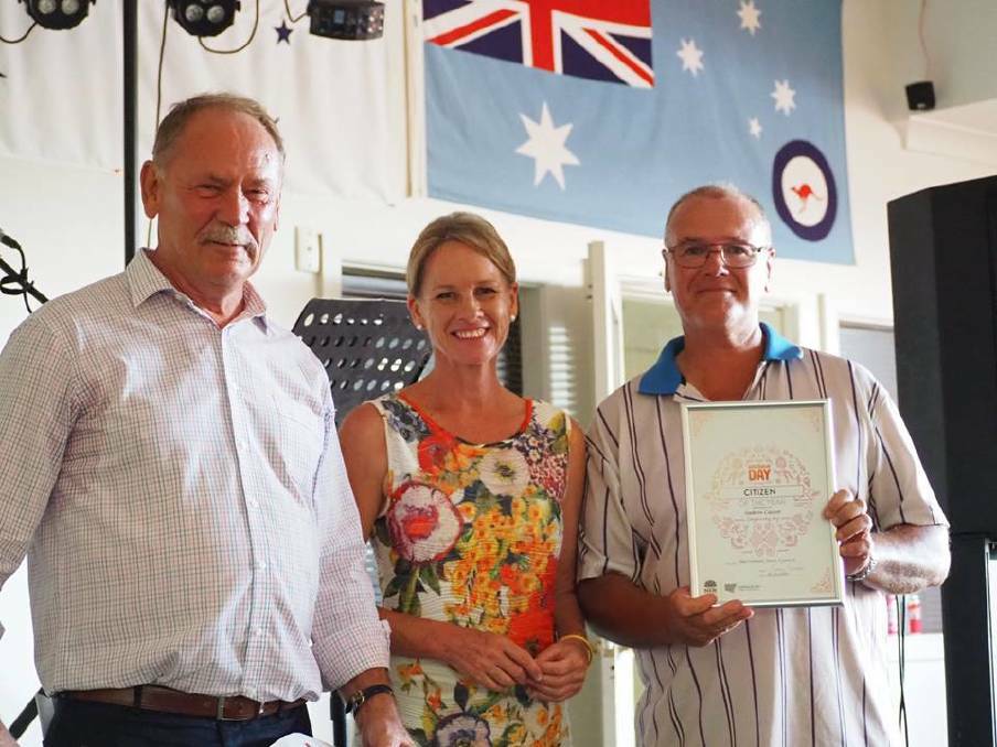 Andrew Cayzer (right) has been nominated for a Connecting Communities award for his free cotton gin tours in Trangie. Photo: CONTRIBUTED