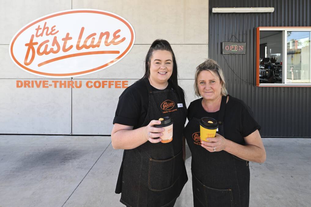 Barista Danni Richards and The Fast Lane Drive-Thru Coffee Wodonga manager Susan Hayes outside the Melbourne Road store. Picture by Mark Jesser