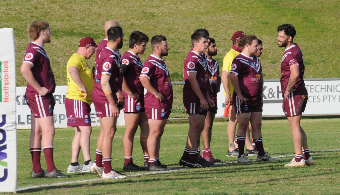 Wellington captain-coach Justin Toomey-White talks to his players late on in Sunday's loss to Parkes. Picture by Nick Guthrie